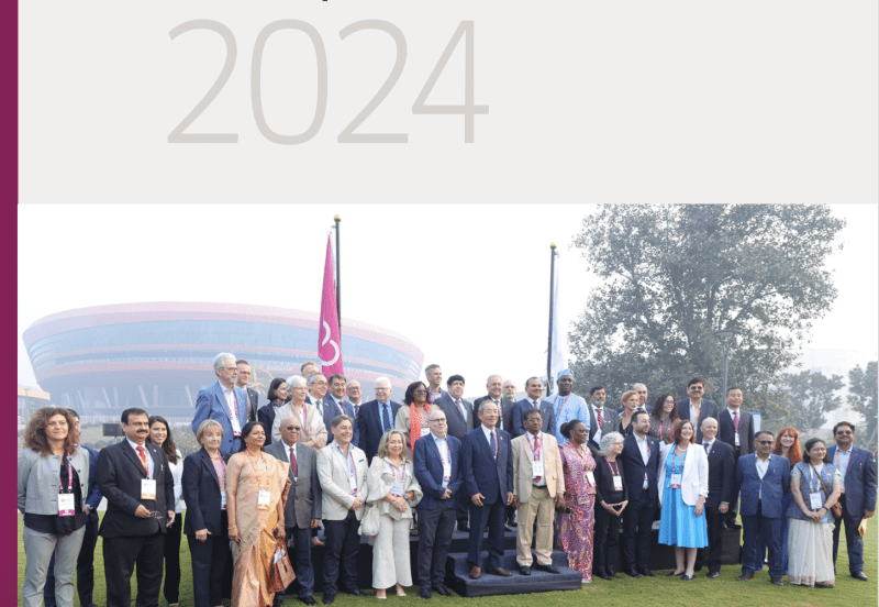 2024 cover of the annual report with the year and a photo of ICA board members outside Bharat Mandapam, host of the 2024 ICA Global Conference