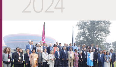 2024 cover of the annual report with the year and a photo of ICA board members outside Bharat Mandapam, host of the 2024 ICA Global Conference